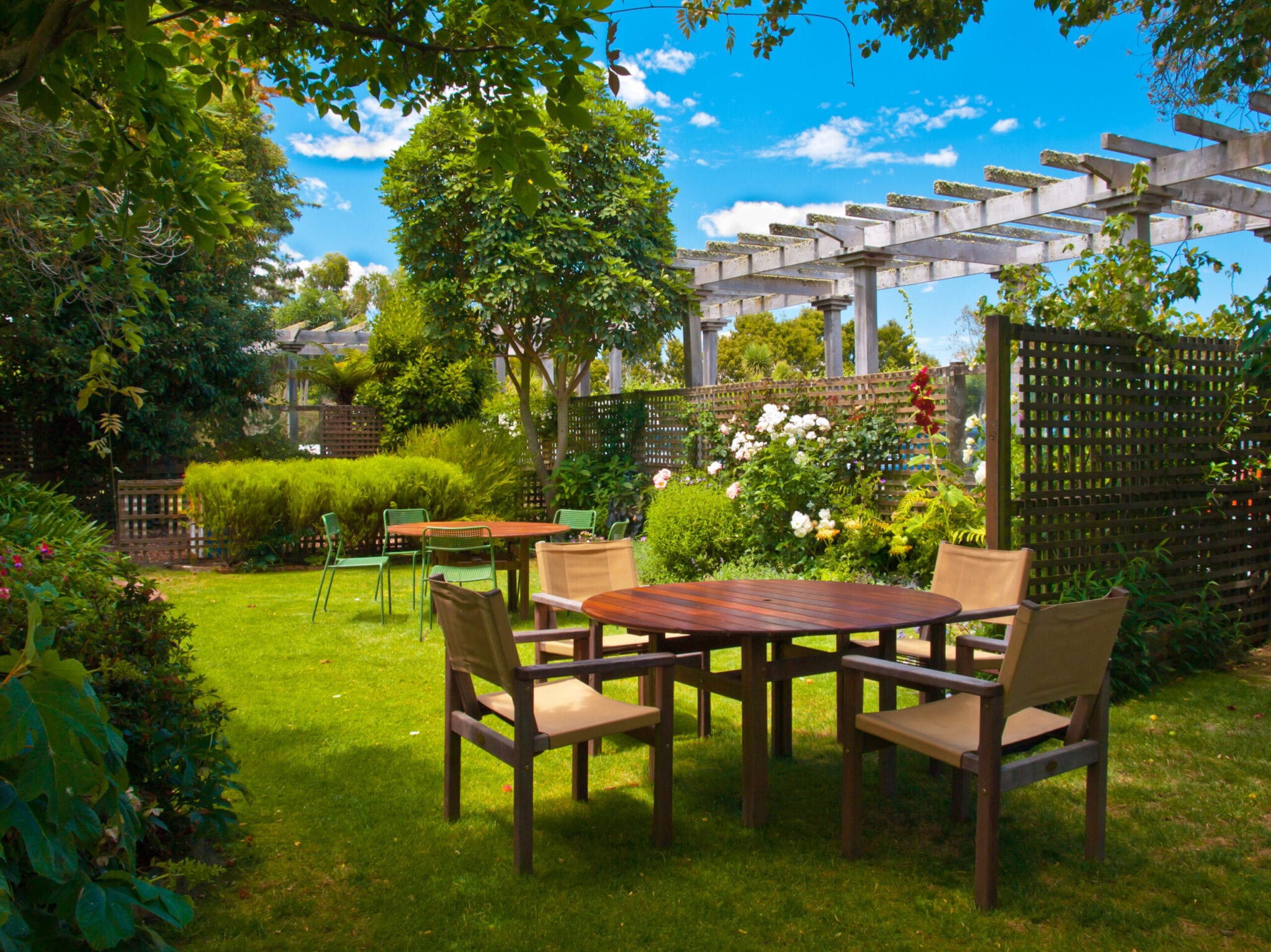 dining table set in lush garden